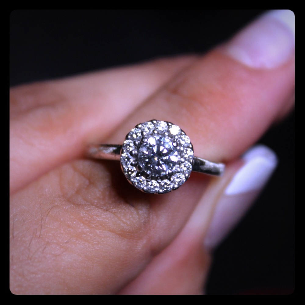 14k white halo dimond ring.